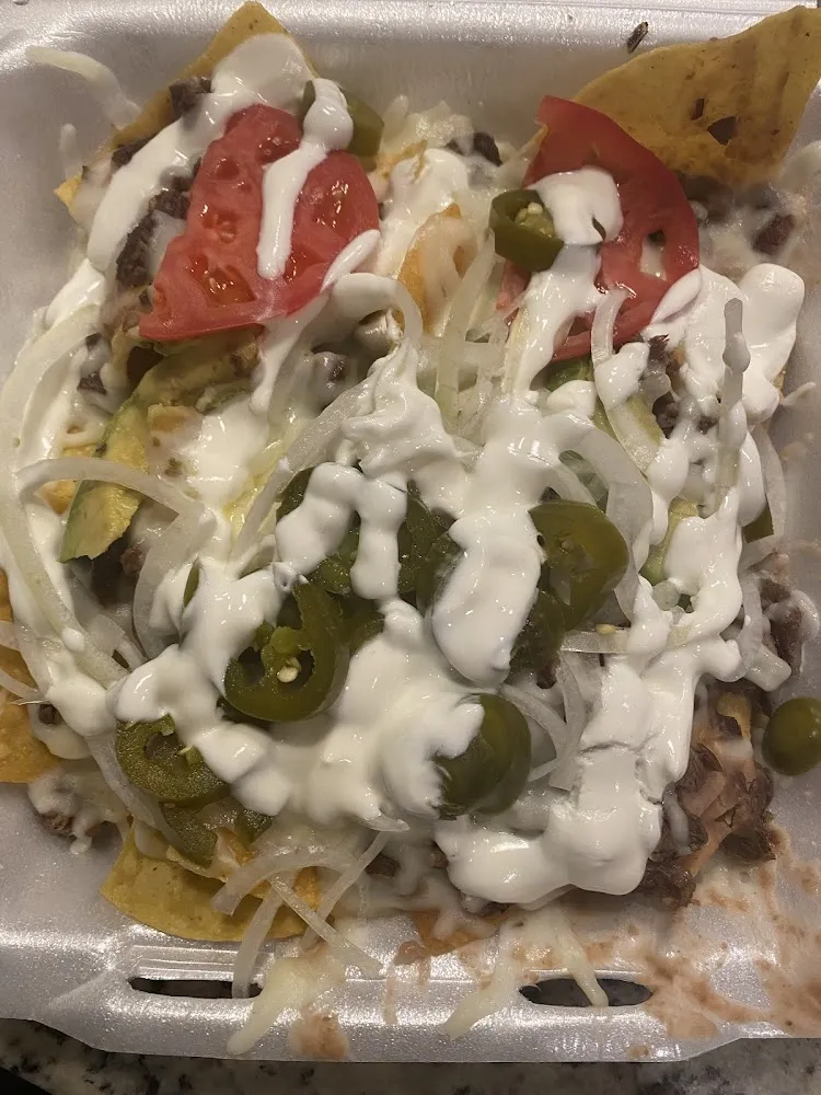 Nacho Special with Steak Nachos Especiales De Asada